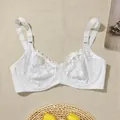 Elegant white full cup underwire lace bra featuring adjustable straps and floral patterns. - 38/85D / Tops / White