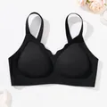 Seamless black soft support bra with comfortable straps and smooth finish - XS / Tops / Black