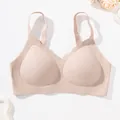 Nude seamless bra with soft support and wave-edge cup detailing - XS / Tops / Nude