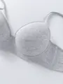 Detail view of light gray cotton bra featuring breathable fabric and underwire - 70B / Tops / Grayish White