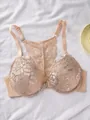 Detailed view of nude front-closure lace bra with floral pattern and racerback design - 70B / Tops / Nude