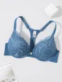 Macro detail of a blue lace bra featuring front closure and stylish racerback design - 70B / Tops / Blue