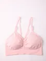 Detail of pink seamless padded sports bra with thin straps and ruched front design. - S / Tops / Pink