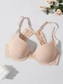 Detailed view of seamless push-up bra with front closure and floral lace back - 70B / Tops / Nude
