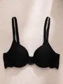 Elegant black push-up bra featuring ribbed cups and delicate lace side wings for a sexy look. - 70B / Tops / Black