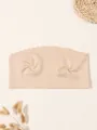 Close-up detail of a nude seamless ice silk bandeau bra featuring scalloped top edges - S / Tops / 2PCS / Nude