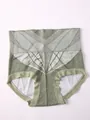 Close-up view of seamless high-waist tummy control panties with geometric pattern - S / Green