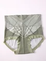 Close-up view of seamless high-waist tummy control panties with geometric pattern - S / Green