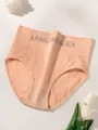 Close-up of apricot high-waisted ribbed panties with letter print and elastic band. - S / Bottoms / Nude