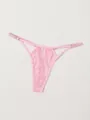Close-up detail of pink floral lace thong with elegant hollow-out design and straps - XS / Pink