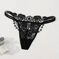 Detailed view of black floral embroidery lace thong with delicate cut-out strap design - XS / Black