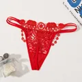 Exquisite red lace thong featuring elegant floral embroidery and a charming bow detail - XS / Red