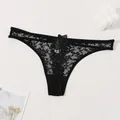 Elegant black lace thong for women featuring exquisite floral appliqué and sexy hollow out detail - XS / Black