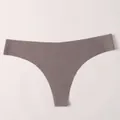 Premium seamless ice silk thong for women, featuring a low-rise fit in sleek taupe purple - S / Bottoms / Gray