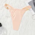 Peach low waist ribbed thong featuring double side straps and gold cross metal details - Apricot