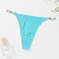 Elegant turquoise ribbed thong featuring gold metal rings and silver rhinestone straps - Cyan