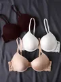 Selección de sujetadores push-up con encaje y aros en colores marrón, blanco y beige - 70B / Tops / Marrón