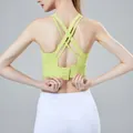 Light green high-stretch sports bra with crisscross back and hook-and-eye closure - XL / Tops / Goose Yellow