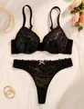 Elegant black lace push-up bra and thong lingerie set on white fabric - Black Pink