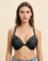 Detailed view of elegant black lace front-closure bra with floral embroidery on model. - 95C / Tops / Black