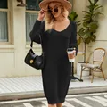Elegant black knitted long-sleeve sweater dress in a relaxed fit for fall and winter - S / Tops / Black