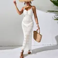 Sexy white crochet maxi dress featuring a V-neck and fringe details for beach wear - S / Top And Bottom / White