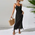 Elegant black sleeveless knitted midi dress featuring a hollow-out design and fringe hem. - S / Top And Bottom / Black