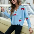 Stylish light blue V-neck knit sweater featuring cherry patterns and fringe hem details - S / Tops / Blue (A722)
