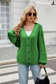 Detail shot of a vibrant green oversized V-neck cable knit cardigan worn by a blonde model - S / Tops / Green