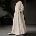 Detailed side view of a minimalist solid color cotton linen maxi dress in cream beige - S / Top And Bottom / Off White