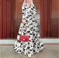 Elegant retro floral printed maxi dress styled with a pink hijab and red handbag - S / White