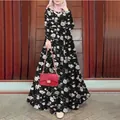Elegant floral print long sleeve maxi dress with loose retro fit and waist belt detail. - S / Black
