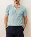 Detailed close-up showing the premium hollow chevron knit texture of this men's polo shirt - M / Tops / Light Blue