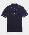 Close-up view of navy blue knitted Polo shirt with contrast white and red piping details. - M / Tops / Dark Blue