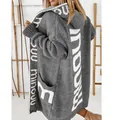 Back view of a stylish grey long hooded knit cardigan featuring bold white letter details. - S / Tops / Gray