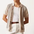 Close-up detail of a men's knitted striped short-sleeved polo shirt worn over a white tank top - M / Tops / Apricot