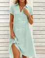 Close-up of green and white striped V-neck summer casual beach dress for women - S / Top And Bottom / Light Green
