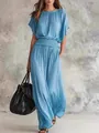 Full-length view of elegant blue maxi dress with smocked waist and flowy skirt - S / Sky Blue