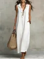 Gedetailleerd zicht op witte boho katoenen linnen jurk met ruches V-hals en handige zakken - S / Top And Bottom / Wit