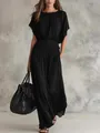 Elegant black long dress with a smocked waist and drapey fabric for a sophisticated summer look - S / Black