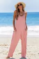 Stylish pink V-neck jumpsuit for women with side pockets, perfect for summer beach vacations - S / Top And Bottom / Pink