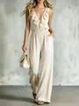 Gedetailleerd beeld van mouwloze crèmekleurige jumpsuit met V-hals en elegante ruches - S / Top And Bottom / Abrikoos