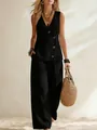 Model wearing a sleeveless black button vest and wide-leg pants set for summer resort style - S / Top And Bottom / Black