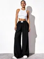 Full body view of black high-waisted wide-leg pants with textured fabric on a model - 3XL / Bottoms / Black
