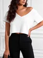 Top corto bianco testurizzato con scollo a V e maniche corte, moda estiva chic - XS / Top / Bianco