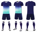 Vues avant latérale et arrière d'un ensemble de maillot de football dégradé bleu marine - 4XS / Haut Et Bas / 120 Bleu Royal