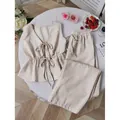 Ensemble deux pièces décontracté avec gilet sans manches rayé et pantalon large beige - Kaki