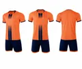 Vistas frontal y trasera del conjunto de camiseta de fútbol naranja fluorescente para entrenar - 4XS / Top Y Pantalón / Naranja