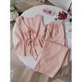 Ensemble deux pièces à rayures roses et blanches, haut à nouer et pantalon large - Rouge Brique