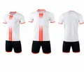 Detailed view of white soccer jersey set with orange stripes and black shorts - 4XS / Top And Bottom / White